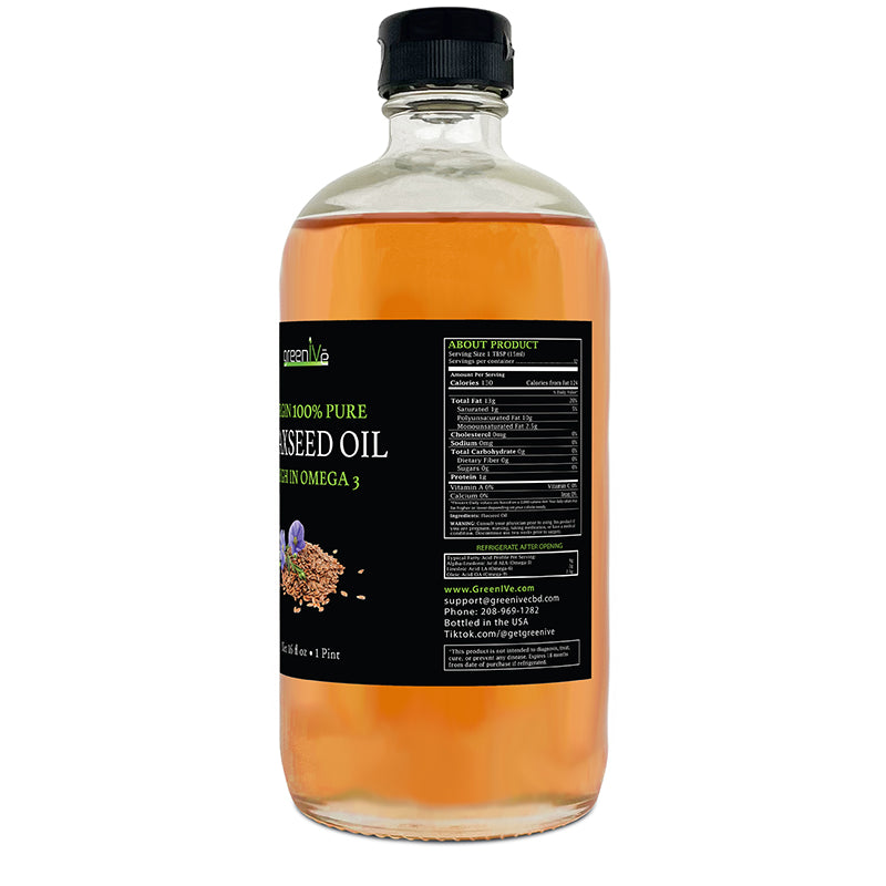 Bottle of sunflower seed oil with a label on a white background