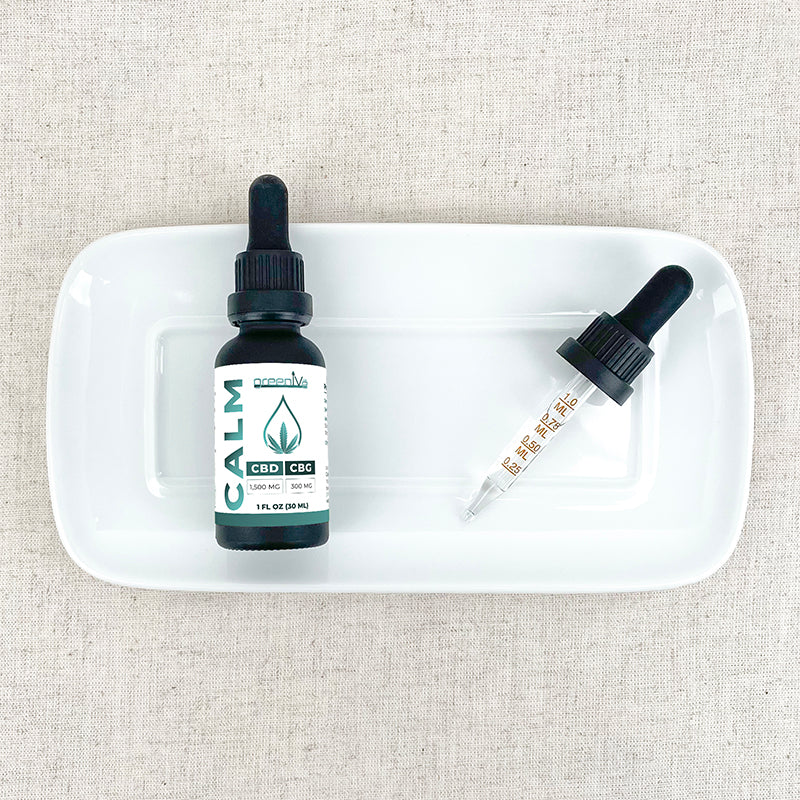 Broad Spectrum Calm CBD Oil on a plate