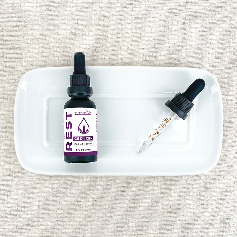 Broad Spectrum CBD + CBN Oil Tincture on a plate