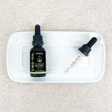 Natural Full Spectrum CBD Oil 450mg on a plate