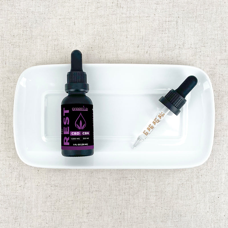 Full Spectrum CBD + CBN Oil Tincture on a plate