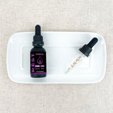 Full Spectrum CBD + CBN Oil Tincture on a plate